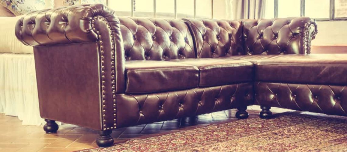Vintage leather sofa decoration in livingroom interior - Vintage Filter