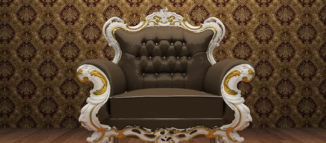 Leather Luxurious armchair in old styled interior with ornament wallpaper